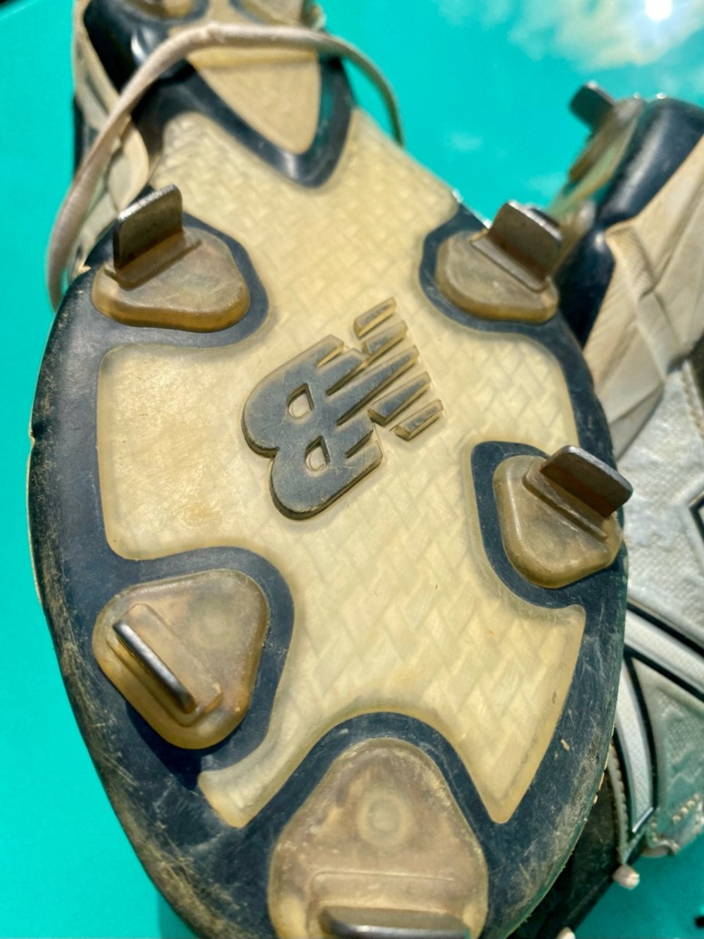 New Balance Baseball Cleats in black and gray - Picture 4 of 5
